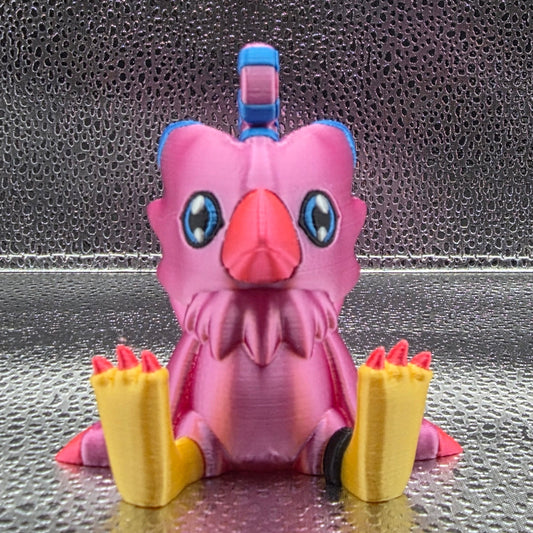 Pink and yellow toy figure on a textured gray background