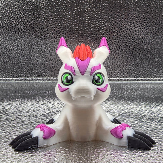 Toy figure of a creature with white, purple, and black colors on a textured surface