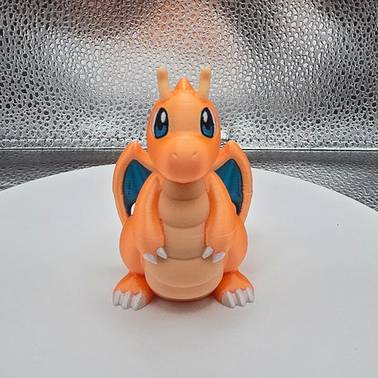 Small figurine of a cartoon character on a textured surface